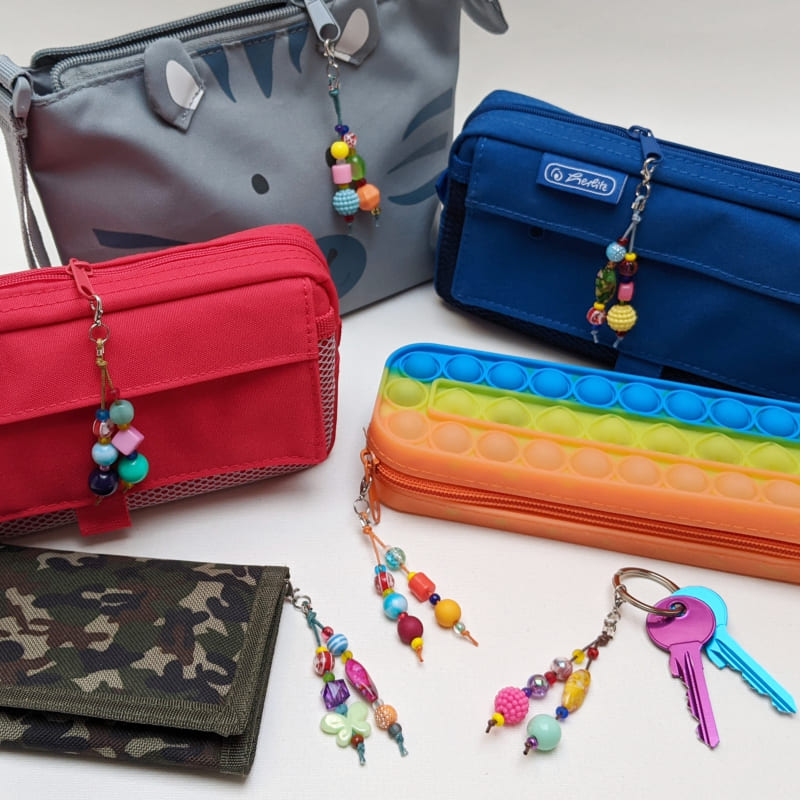 Taschenbaumler für Kinder dekoriert an Täschchen und Mäppchen Taschenbaumler für Kinder dekoriert an Täschchen und Mäppchen