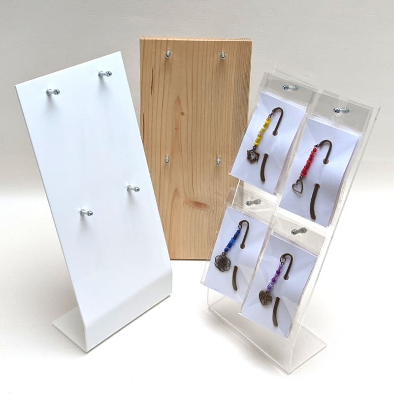 Verkaufsständer aus klarem Plexiglas für 12 Lesezeichen in Geschenkverpackung mit Loch Verkaufsständer aus klarem Plexiglas für 12 Lesezeichen in Geschenkverpackung mit Loch