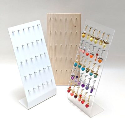 Verkaufsständer für 30 Schutzengel aus transparentem Plexiglas dekoriert mit Ware